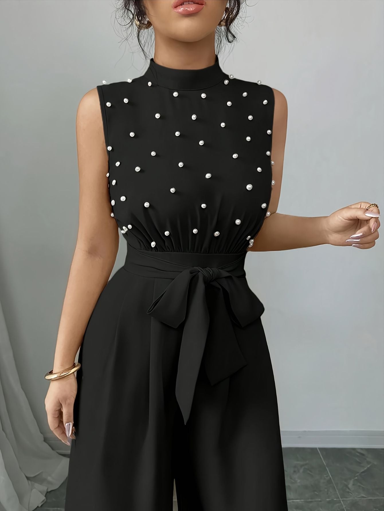 Sleeveless High-Neck Jumpsuit