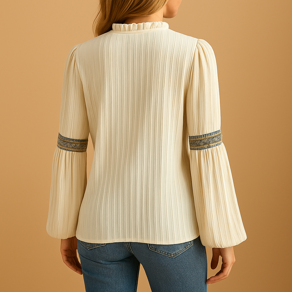 Women’s elegant blouse with lace details, lantern sleeves, and a loose fit, suitable for work, casual wear, and evening outings.