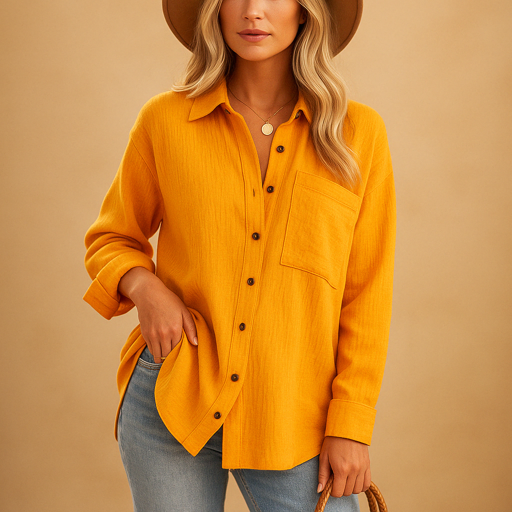 Long sleeve polo shirt for women with a classic collar, button closure, and chest pocket, suitable for work and casual outfits.