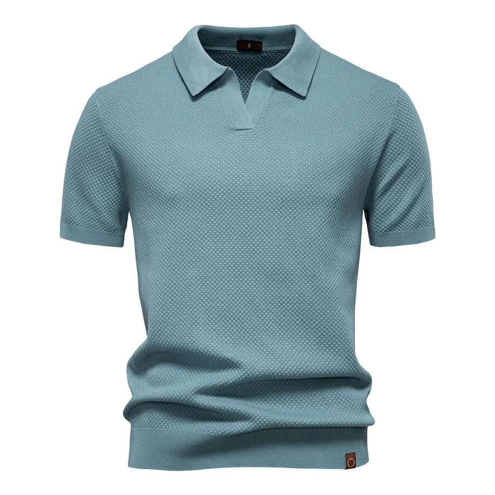 Men’s polo shirt with a structured collar, short sleeves, and tailored fit, ideal for summer days, casual outings, and smart-casual wear.