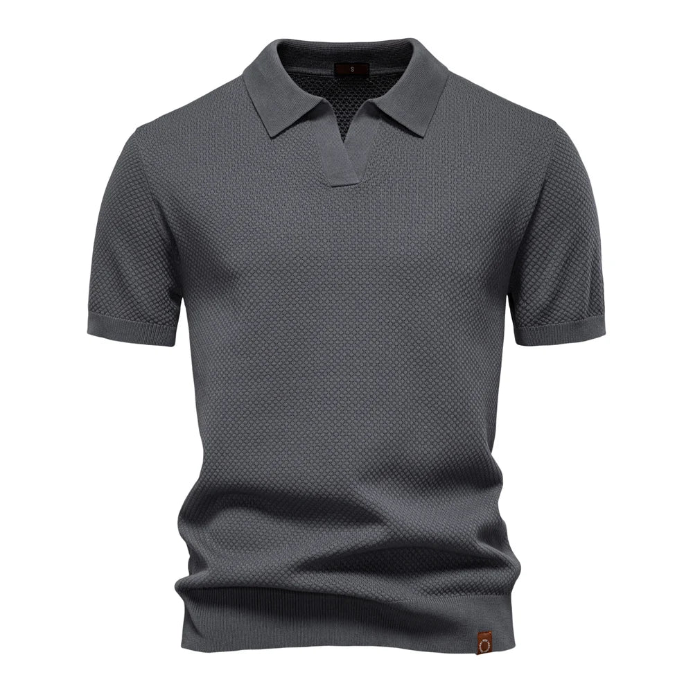 Men’s polo shirt with a structured collar, short sleeves, and tailored fit, ideal for summer days, casual outings, and smart-casual wear.