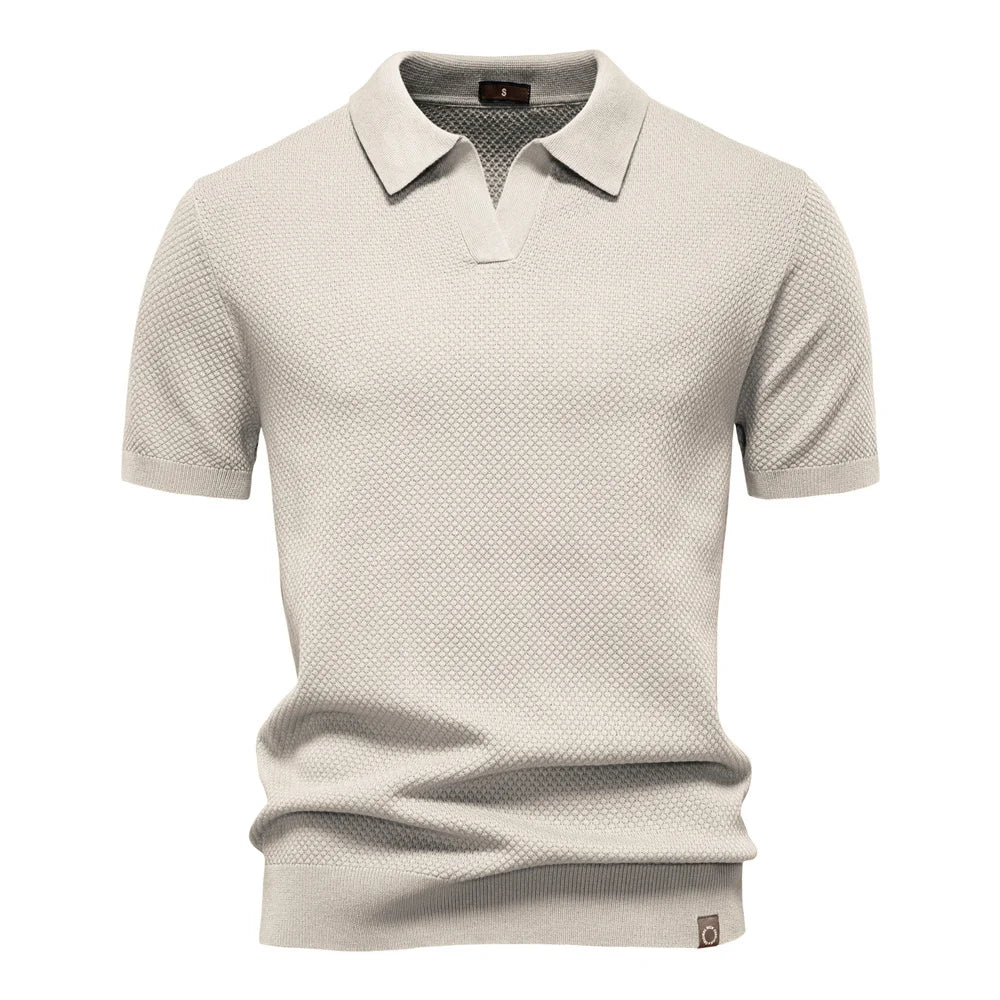 Men’s polo shirt with a structured collar, short sleeves, and tailored fit, ideal for summer days, casual outings, and smart-casual wear.