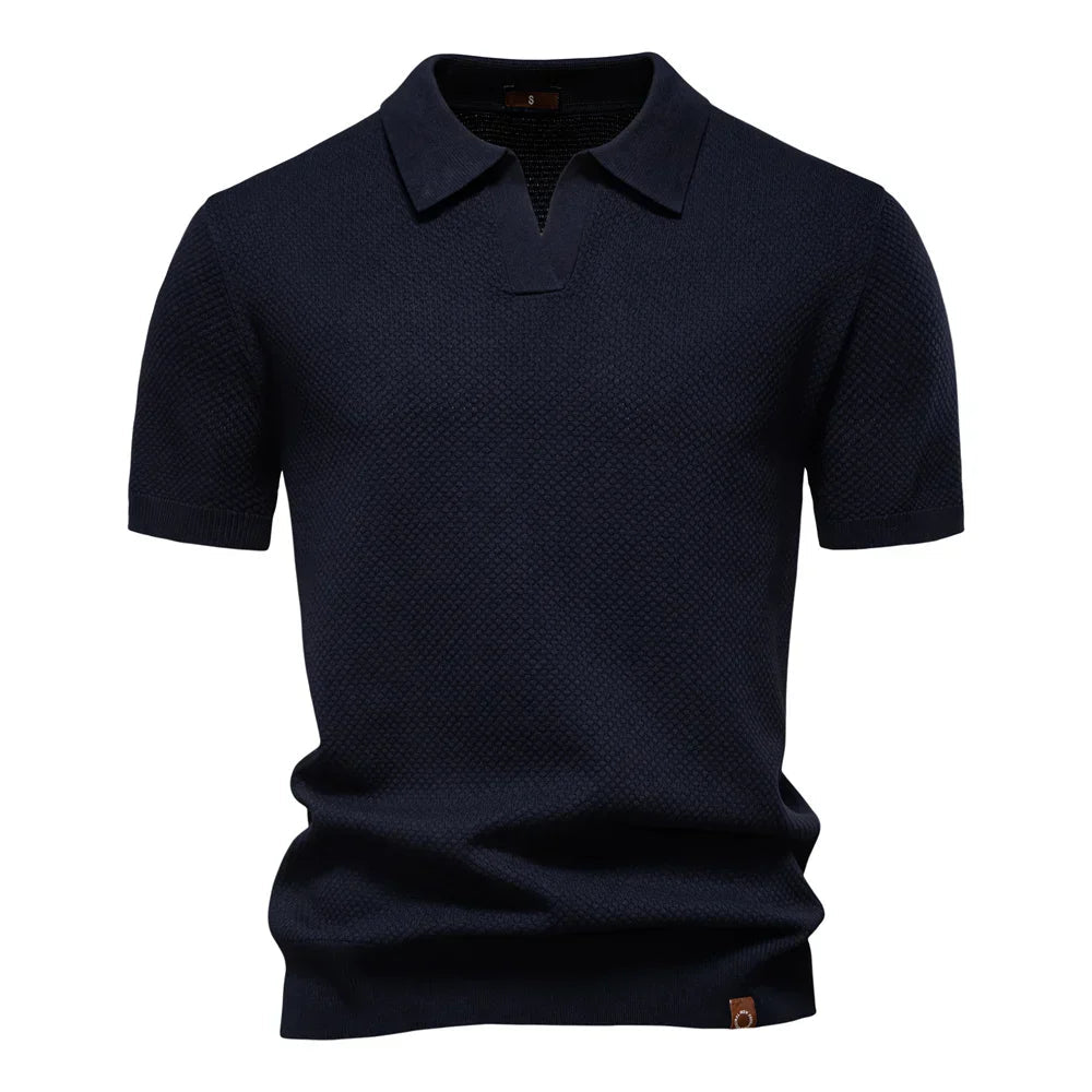 Men’s polo shirt with a structured collar, short sleeves, and tailored fit, ideal for summer days, casual outings, and smart-casual wear.