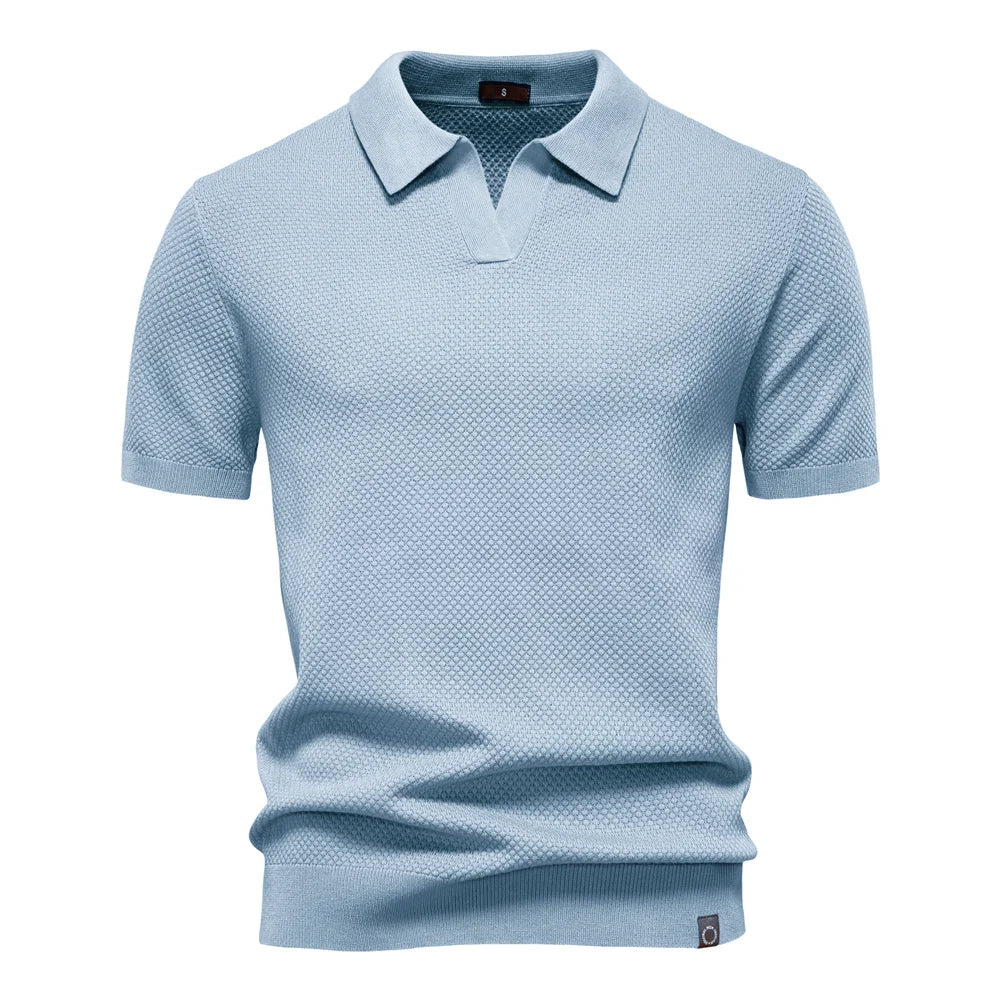 Men’s polo shirt with a structured collar, short sleeves, and tailored fit, ideal for summer days, casual outings, and smart-casual wear.