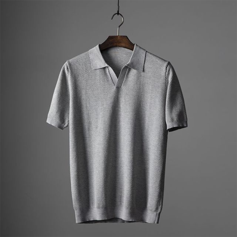 Men’s polo shirt with a textured design, classic collar, and short sleeves, ideal for casual outings, summer wear, weekend plans, and smart-casual occasions.