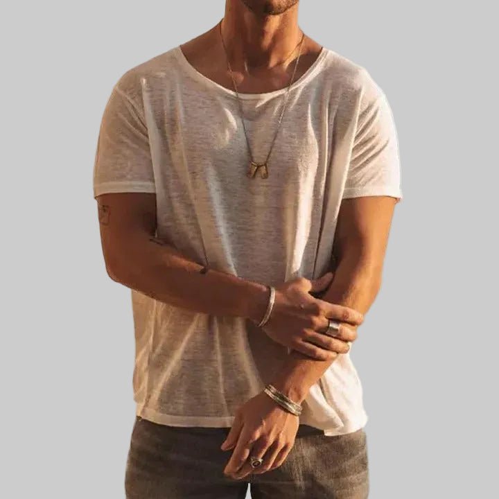 Men’s T-shirt with a round neckline, short sleeves, and relaxed fit, ideal for casual outings, layering, lounging, and everyday wear.