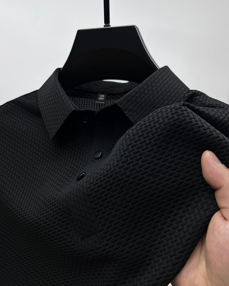 Men’s textured polo shirt with a button placket, short sleeves, and tailored fit, ideal for summer days, casual outings, and smart-casual wear.