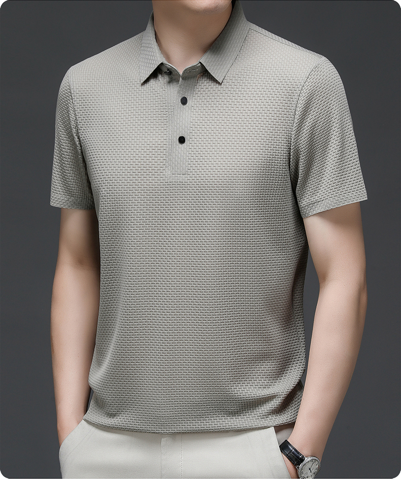 Men’s textured polo shirt with a button placket, short sleeves, and tailored fit, ideal for summer days, casual outings, and smart-casual wear.