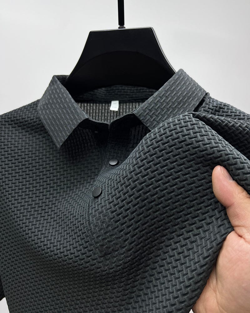 Men’s textured polo shirt with a button placket, short sleeves, and tailored fit, ideal for summer days, casual outings, and smart-casual wear.