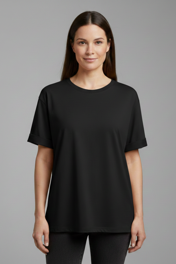 Women’s oversized T-shirt with round neckline, rolled short sleeves, loose fit, and hip-length hem, suitable for casual wear and relaxed outfits.