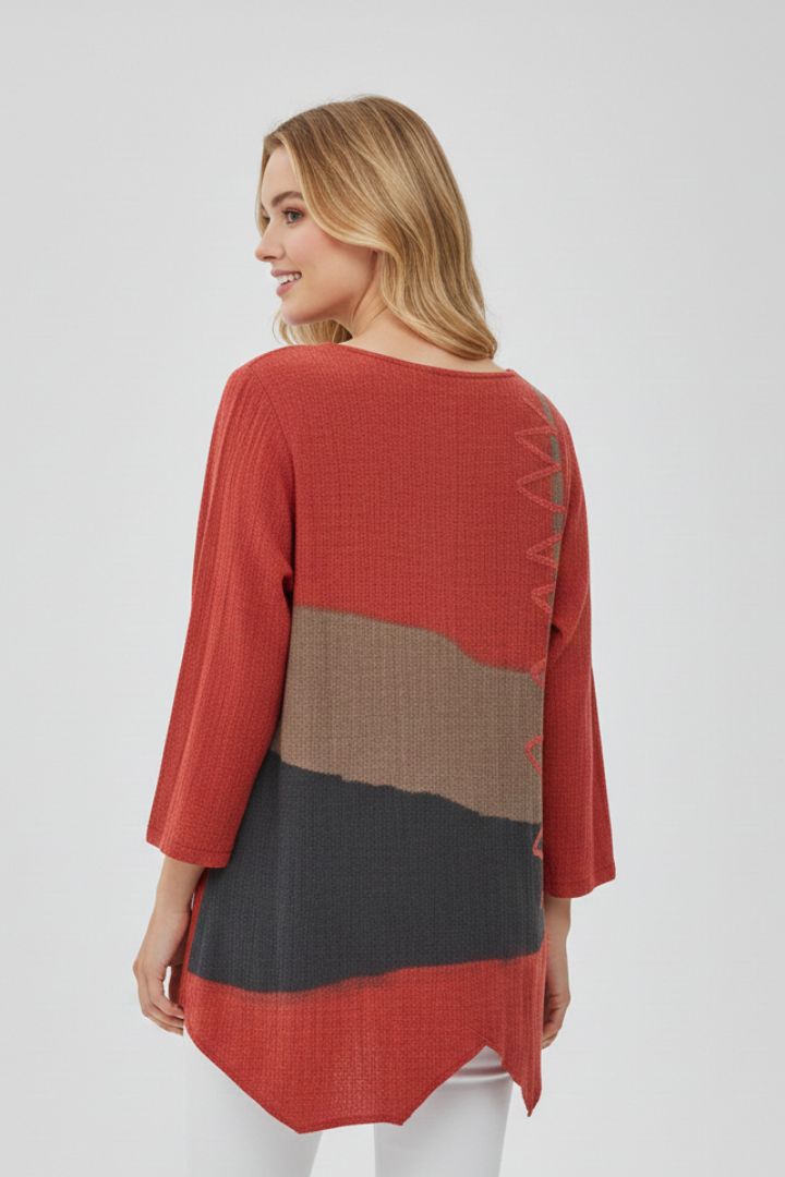 Women’s printed V-neck top with loose fit, wide short sleeves, and asymmetrical hem with side slits, suitable for summer and casual outfits.