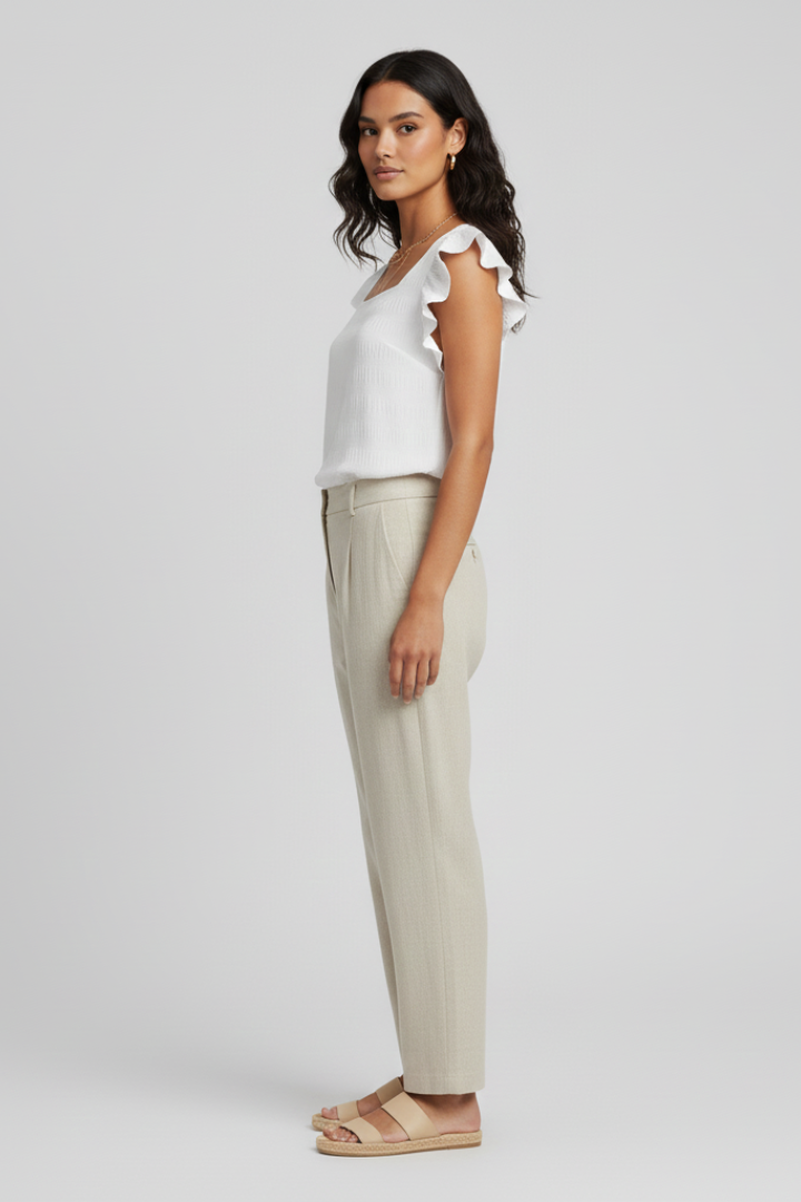 Women’s square neck blouse with short sleeves, loose fit, and textured woven surface, suitable for everyday wear and casual outfits.