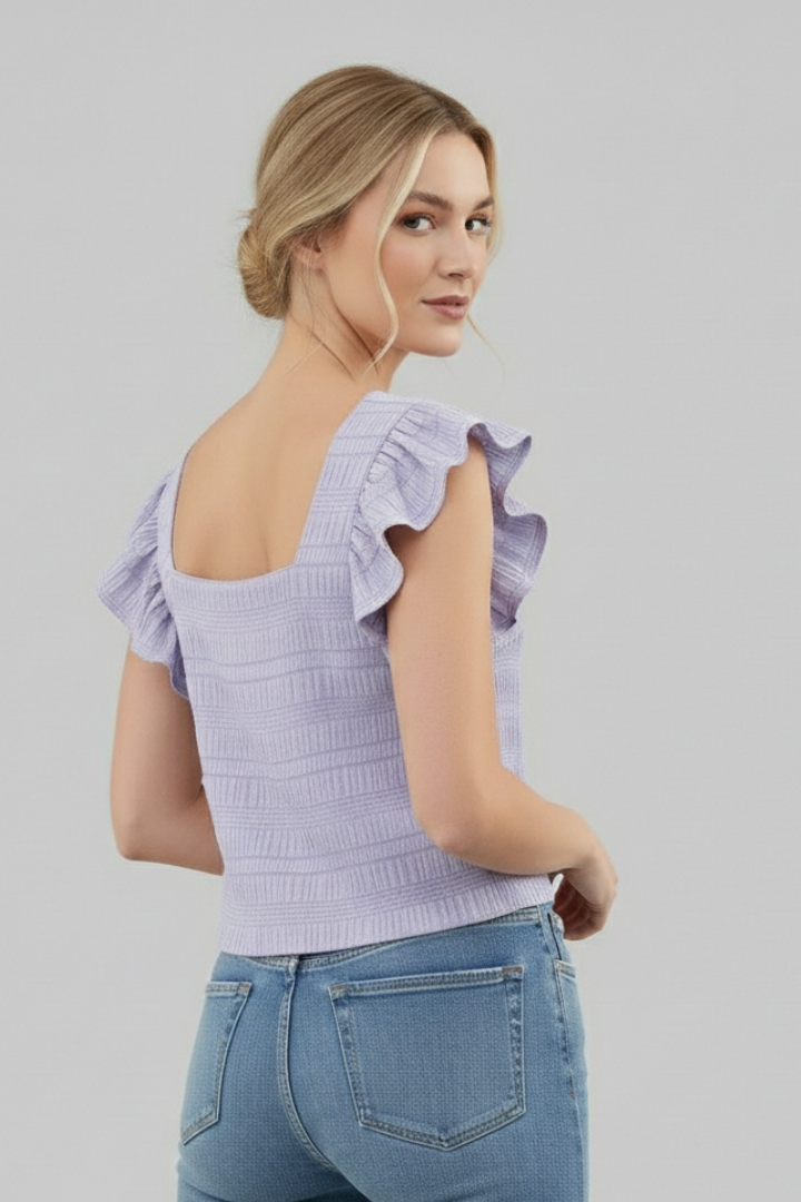 Women’s square neck blouse with flutter cap sleeves, relaxed fit, and textured surface, suitable for everyday wear and casual outfits.