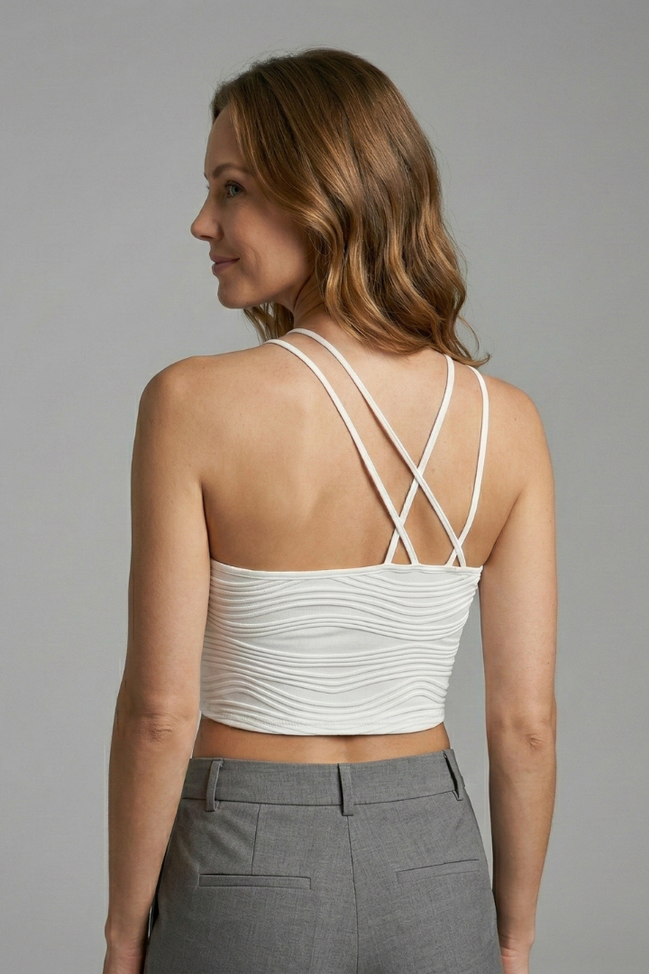Women’s crop top with asymmetrical neckline and double strap detail, designed for casual wear and summer outfits