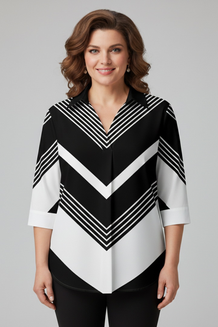 Women’s blouse with chevron stripe print and button front detail, featuring three-quarter sleeves and an asymmetrical hem for everyday styling.