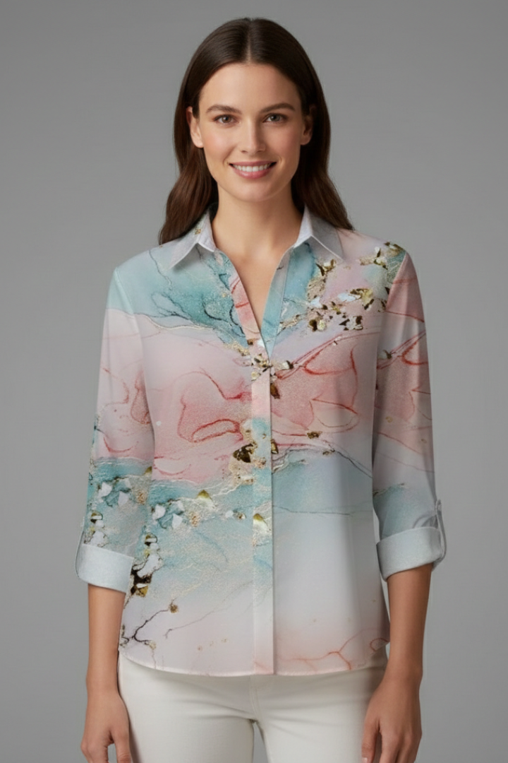 Women’s blouse with V-neck and floral print, featuring long sleeves and button fastening, suitable for everyday and work wear.