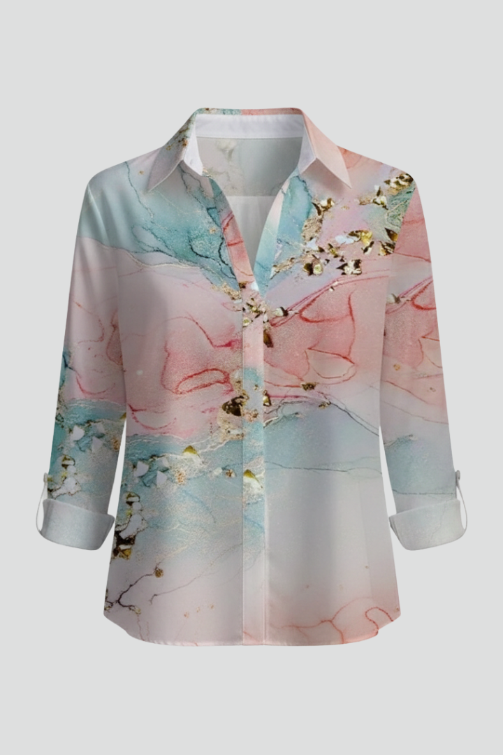 Women’s blouse with V-neck and floral print, featuring long sleeves and button fastening, suitable for everyday and work wear.