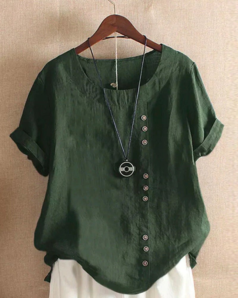 Women’s blouse with decorative button details, short sleeves, and a relaxed fit, ideal for casual summer outfits, travel, and everyday wear.