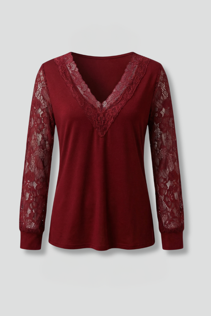 Women’s blouse with textured lace sleeves, structured V-neckline, straight hem, and smooth woven surface for elegant everyday styling.