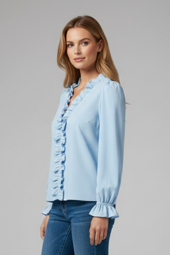 Women’s blouse featuring a V-neckline with vertical ruffle detail and long sleeves with gathered cuffs, suitable for office and everyday wear.