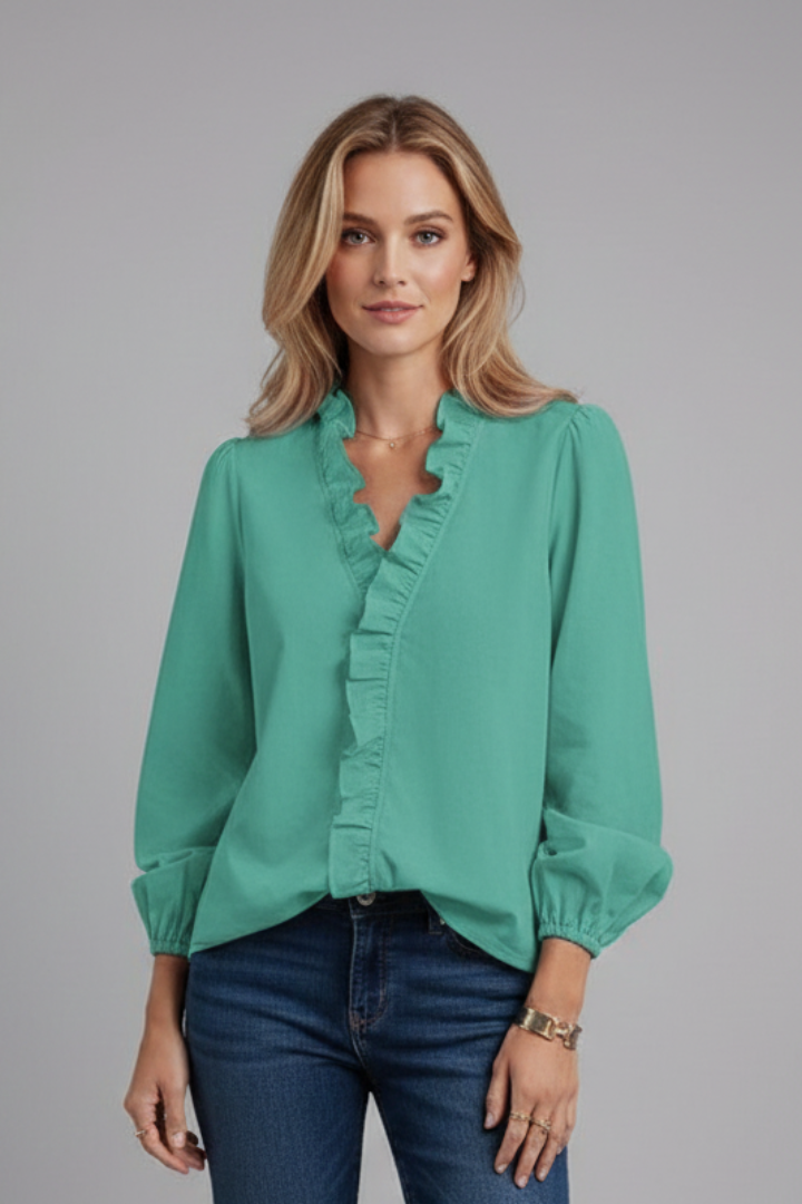 Women’s blouse featuring a V-neckline with vertical ruffle detail and long sleeves with gathered cuffs, suitable for office and everyday wear.