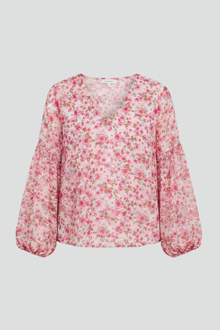 Women’s long sleeve blouse with V-neckline, elasticated cuffs, and all-over floral print, suitable for casual wear and everyday styling.