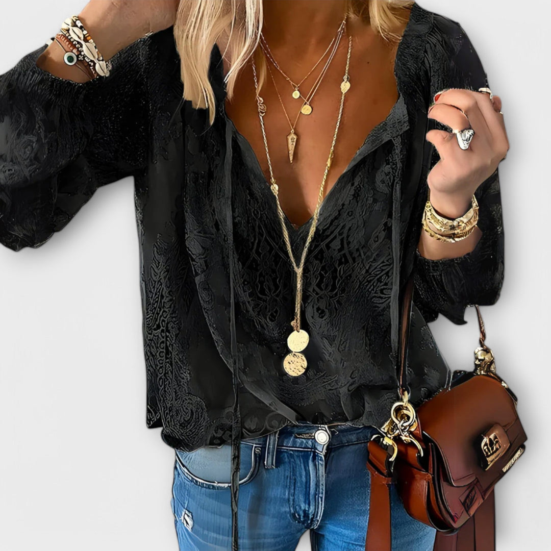 Women’s boho top with a V-neckline, long sleeves, and relaxed fit, perfect for casual summer outfits, vacations, and everyday wear.