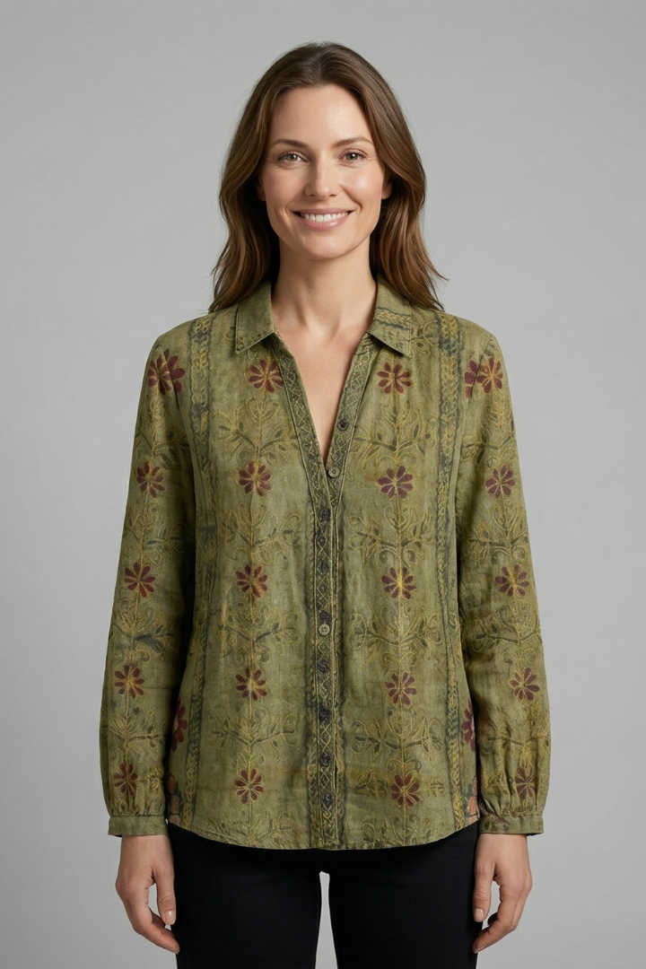 Women’s blouse with button front, structured neckline, and long sleeves, ideal for office wear and casual everyday outfits.