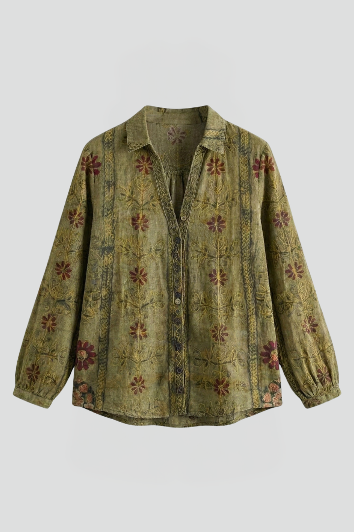 Women’s blouse with button front, structured neckline, and long sleeves, ideal for office wear and casual everyday outfits.