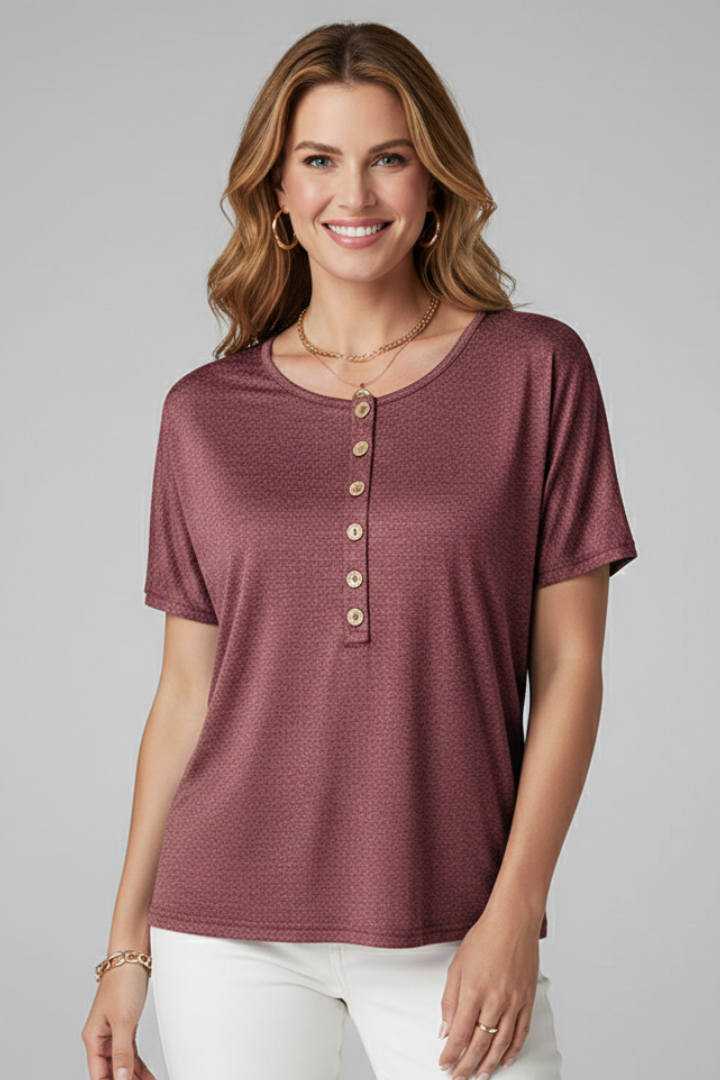 Women’s T-shirt with round neckline and button placket detail, designed for everyday wear and casual outfits.