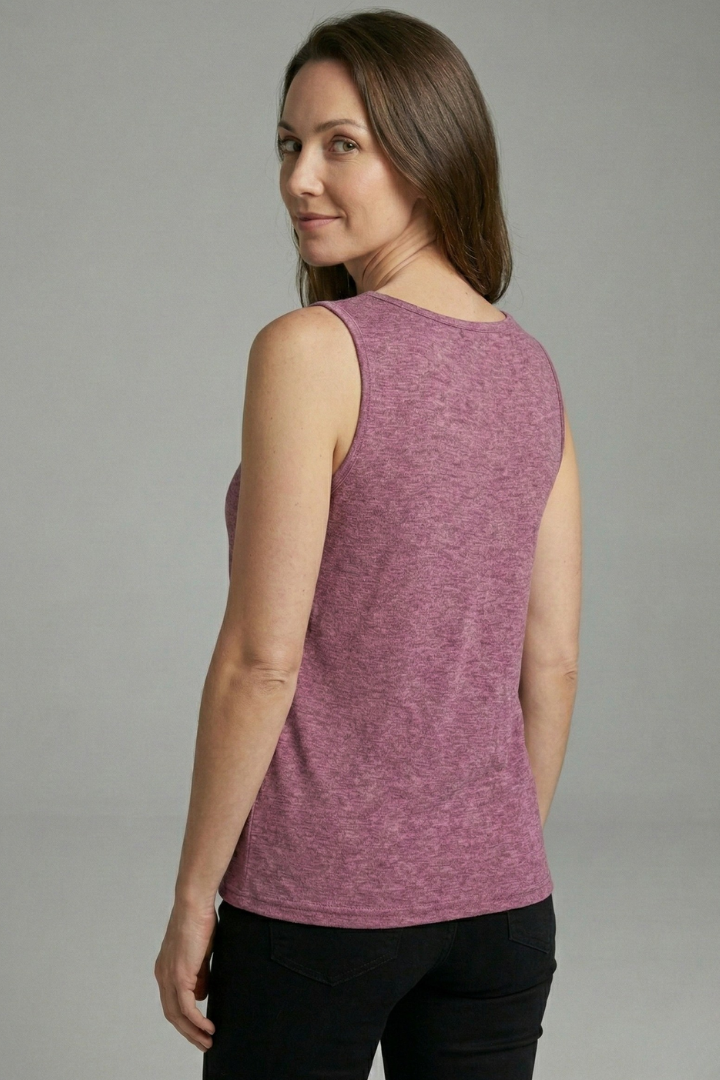 Women’s sleeveless top with V-neckline, decorative front buttons, and wide straps, suitable for casual wear and office outfits.