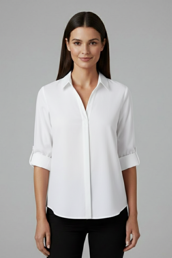 Women’s button-up blouse with collared neckline, long sleeves, and chest pocket, suitable for office wear and everyday styling.