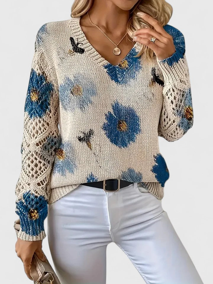 Women’s cardigan with a floral pattern, V-neckline, and open-weave sleeves, ideal for casual outings, office wear, and layered styling.