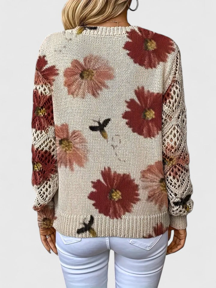 Women’s cardigan with a floral pattern, V-neckline, and open-weave sleeves, ideal for casual outings, office wear, and layered styling.
