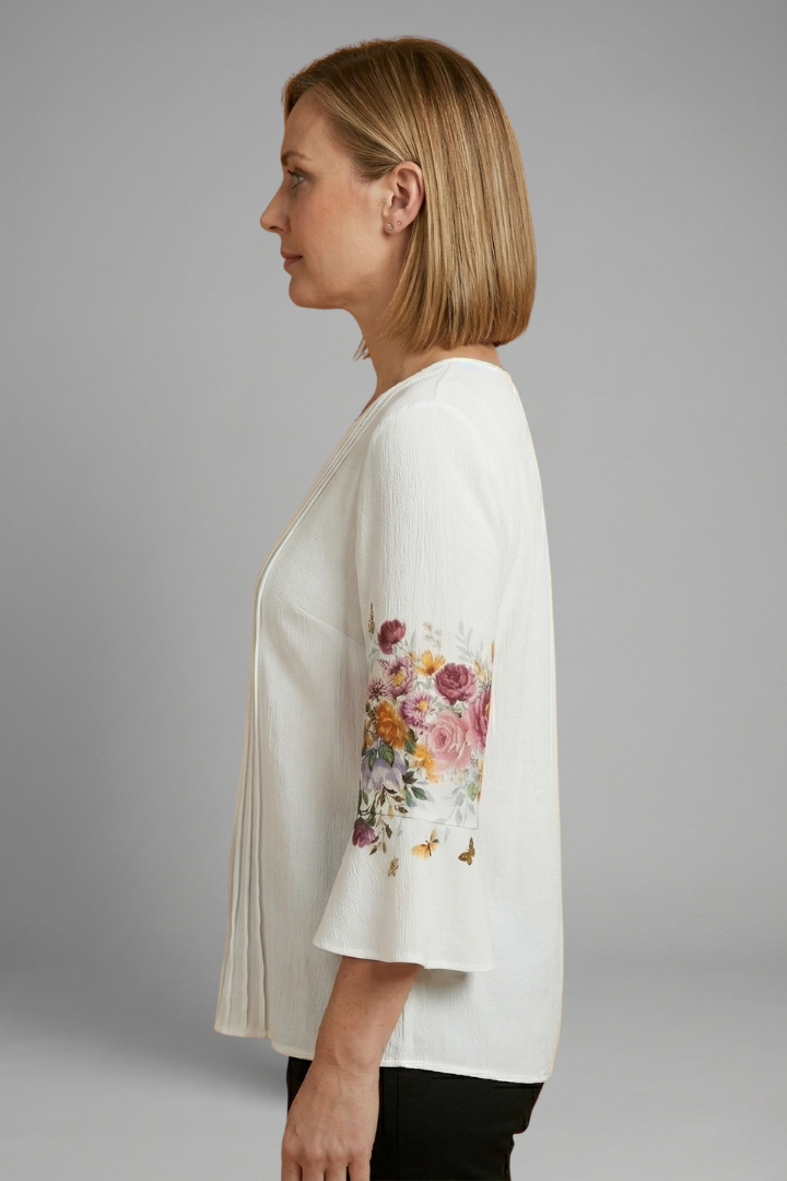 Women’s cotton blend top with round neckline, short sleeves, smooth woven surface, and straight hem for everyday styling.