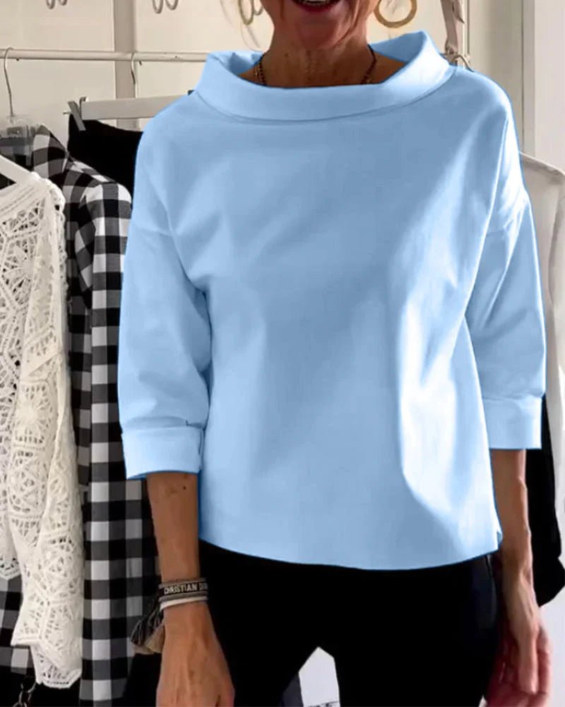 Women’s top with cowl neck, 3/4 sleeves, and relaxed fit, suitable for office outfits, casual evenings, and everyday styling.