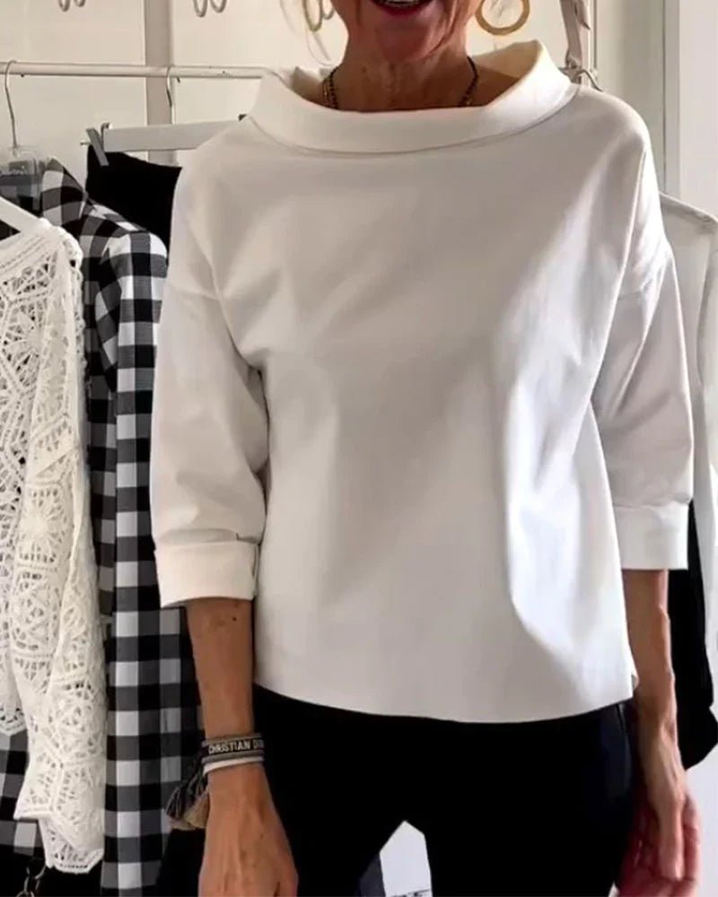 Women’s top with cowl neck, 3/4 sleeves, and relaxed fit, suitable for office outfits, casual evenings, and everyday styling.