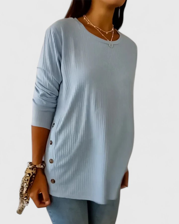 Women’s crew neck top featuring a relaxed fit and classic neckline, ideal for everyday wear, casual outfits, and versatile styling.