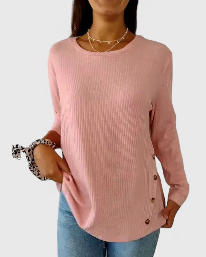 Women’s crew neck top featuring a relaxed fit and classic neckline, ideal for everyday wear, casual outfits, and versatile styling.