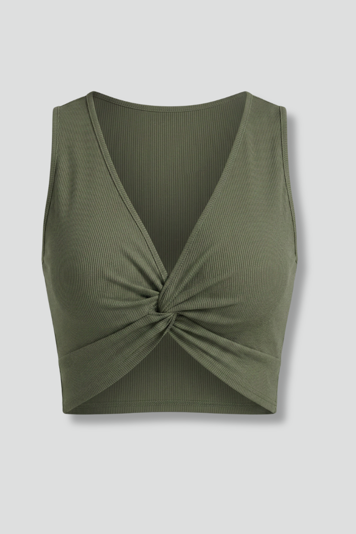 Women’s crop top with deep v-neck, twist front detail, and sleeveless fit, ideal for summer outfits and evening fashion styling.