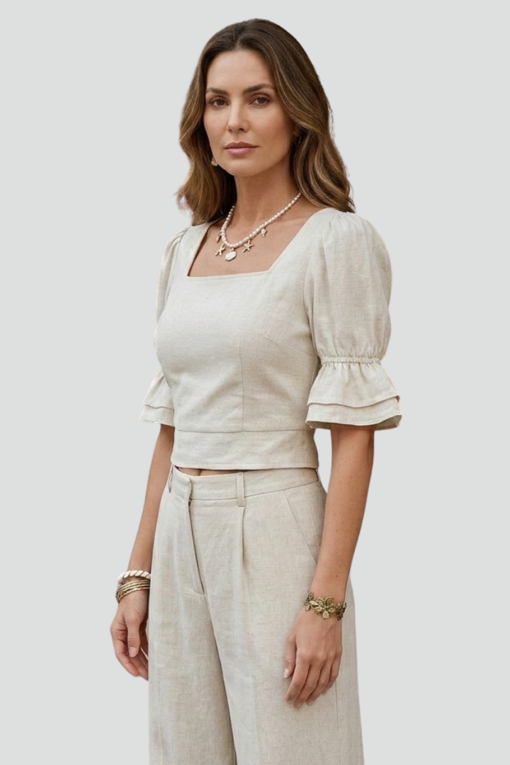 Women’s crop top with square neckline and short puff sleeves, ideal for casual summer outfits and everyday fashion styling.