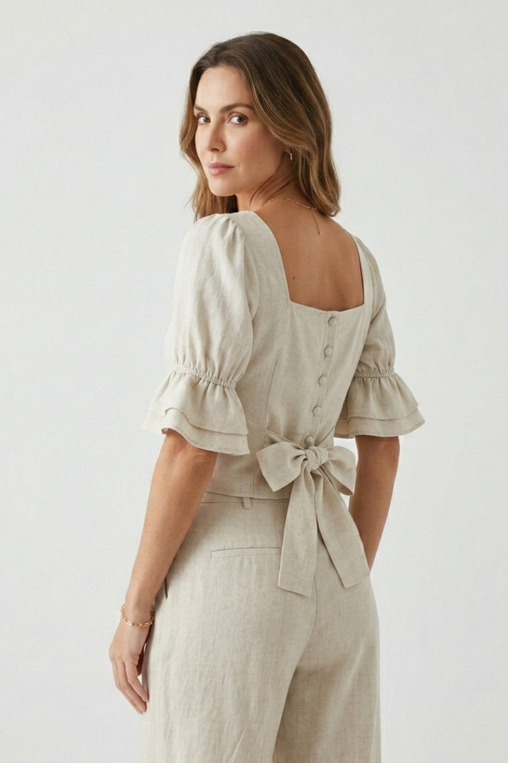 Women’s crop top with square neckline and short puff sleeves, ideal for casual summer outfits and everyday fashion styling.