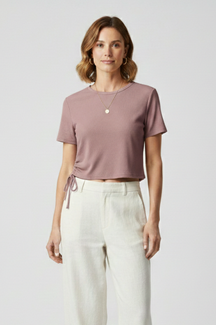 Women’s cropped T-shirt with side ruching and adjustable tie detail, designed for casual wear and modern styling.