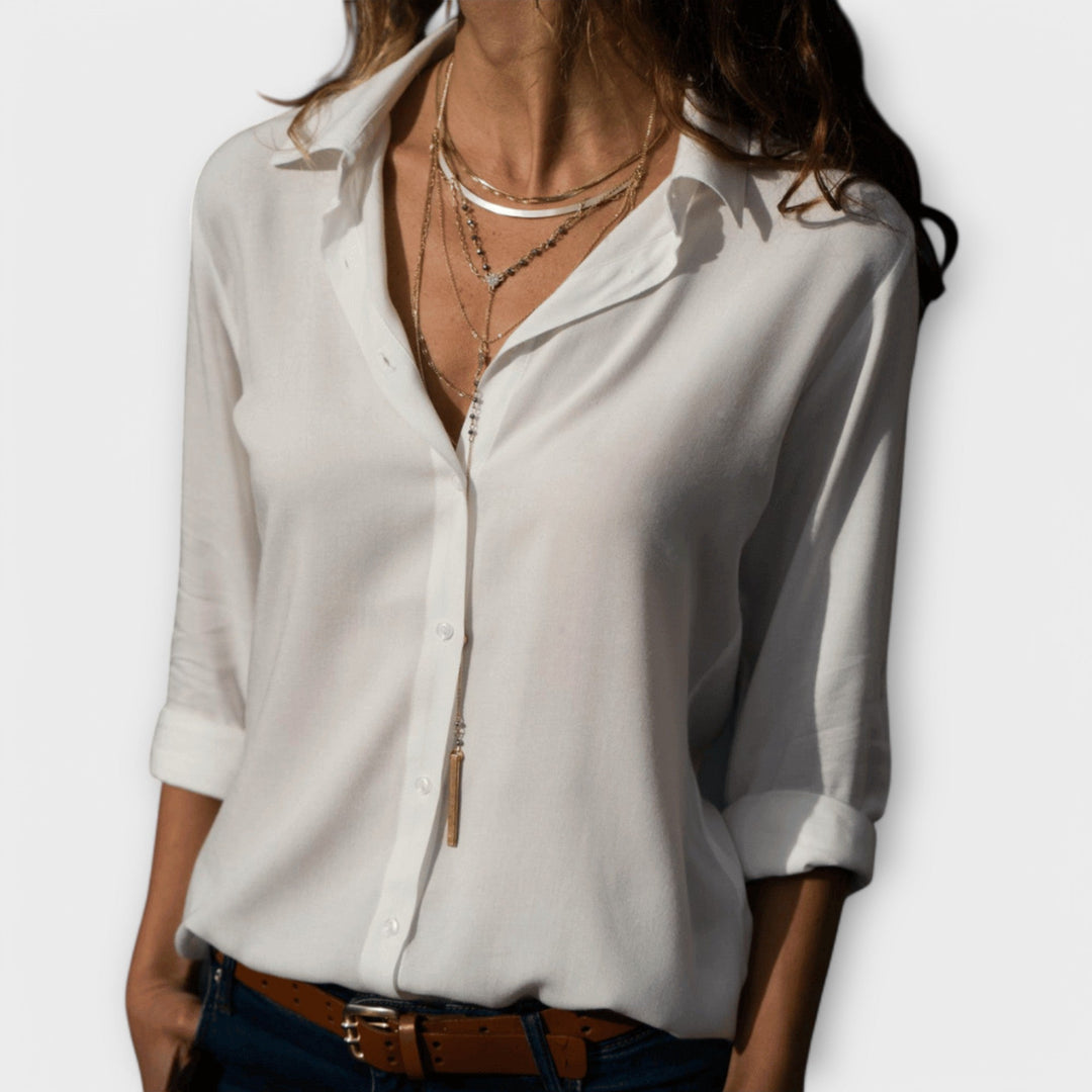 Women’s elegant blouse with refined fit and timeless silhouette, ideal for office wear, dinners, and casual everyday styling.