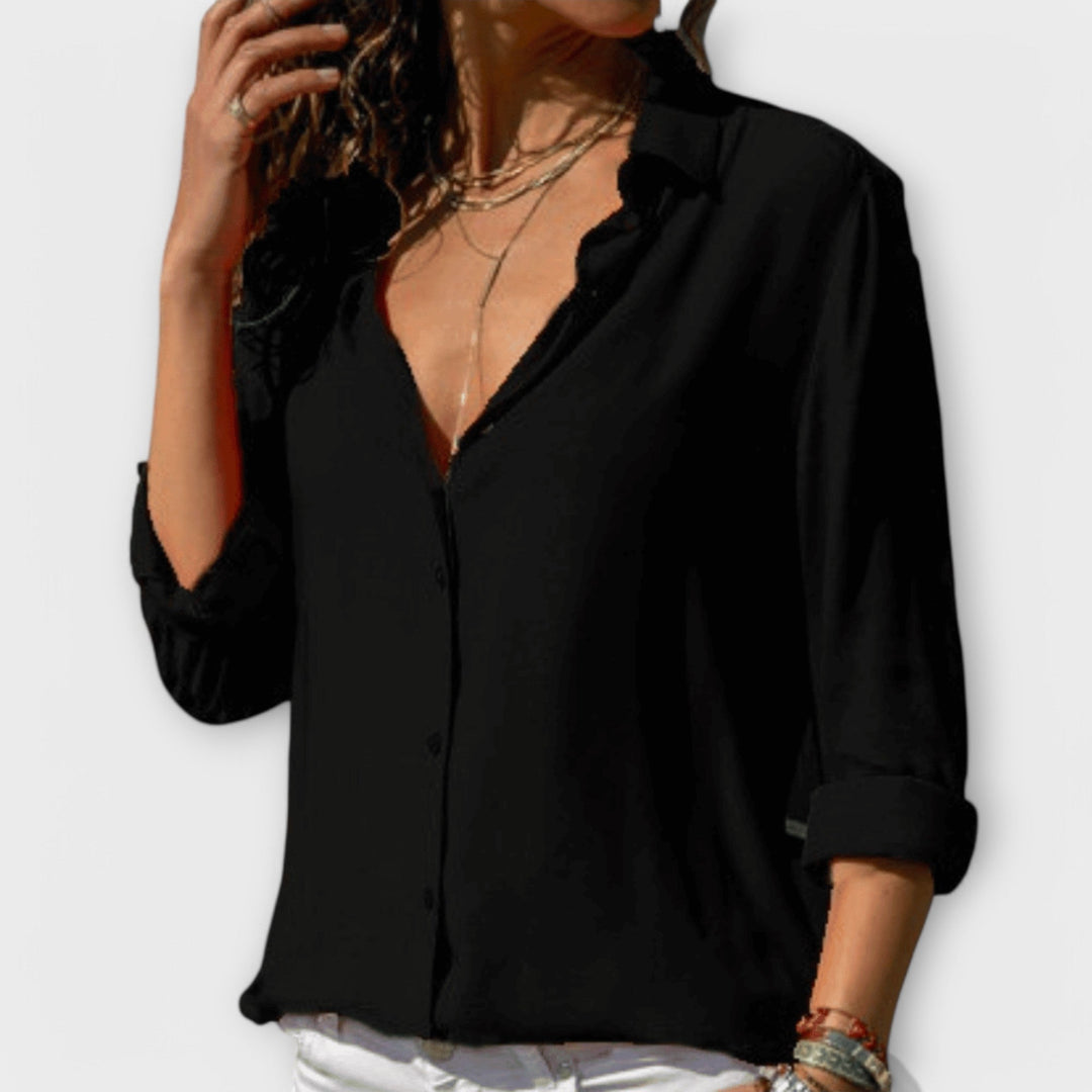 Women’s elegant blouse with refined fit and timeless silhouette, ideal for office wear, dinners, and casual everyday styling.