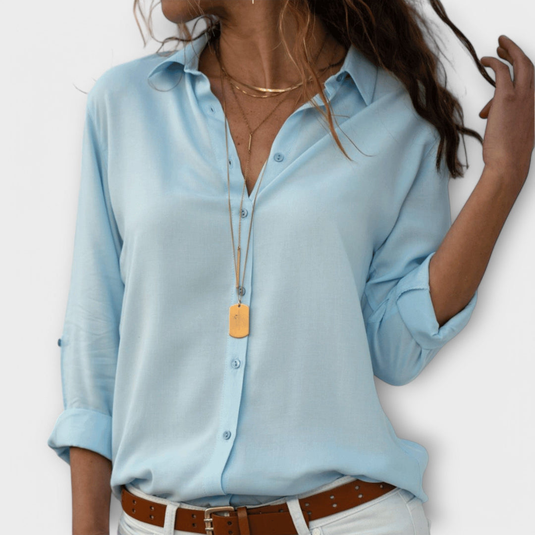 Women’s elegant blouse with refined fit and timeless silhouette, ideal for office wear, dinners, and casual everyday styling.