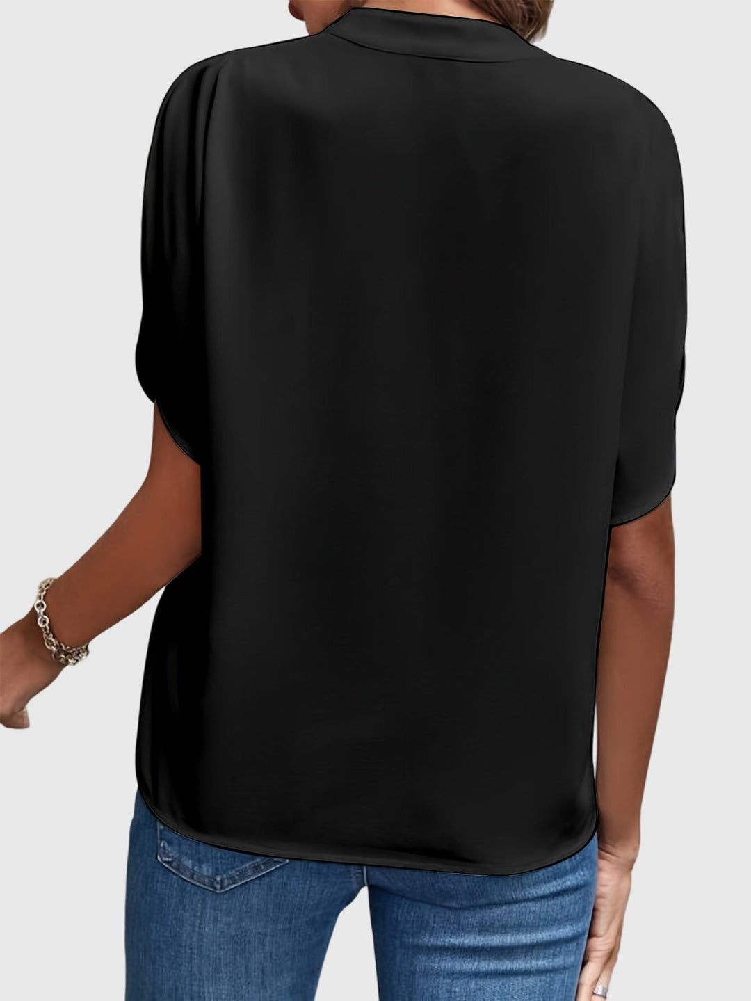 Women’s elegant blouse with tailored fit and timeless silhouette, ideal for office wear, dinners, and casual everyday styling.