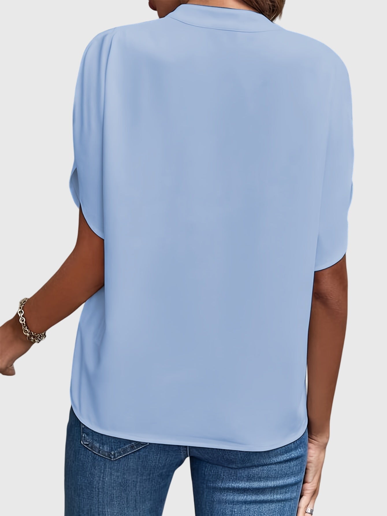 Women’s elegant blouse with tailored fit and timeless silhouette, ideal for office wear, dinners, and casual everyday styling.