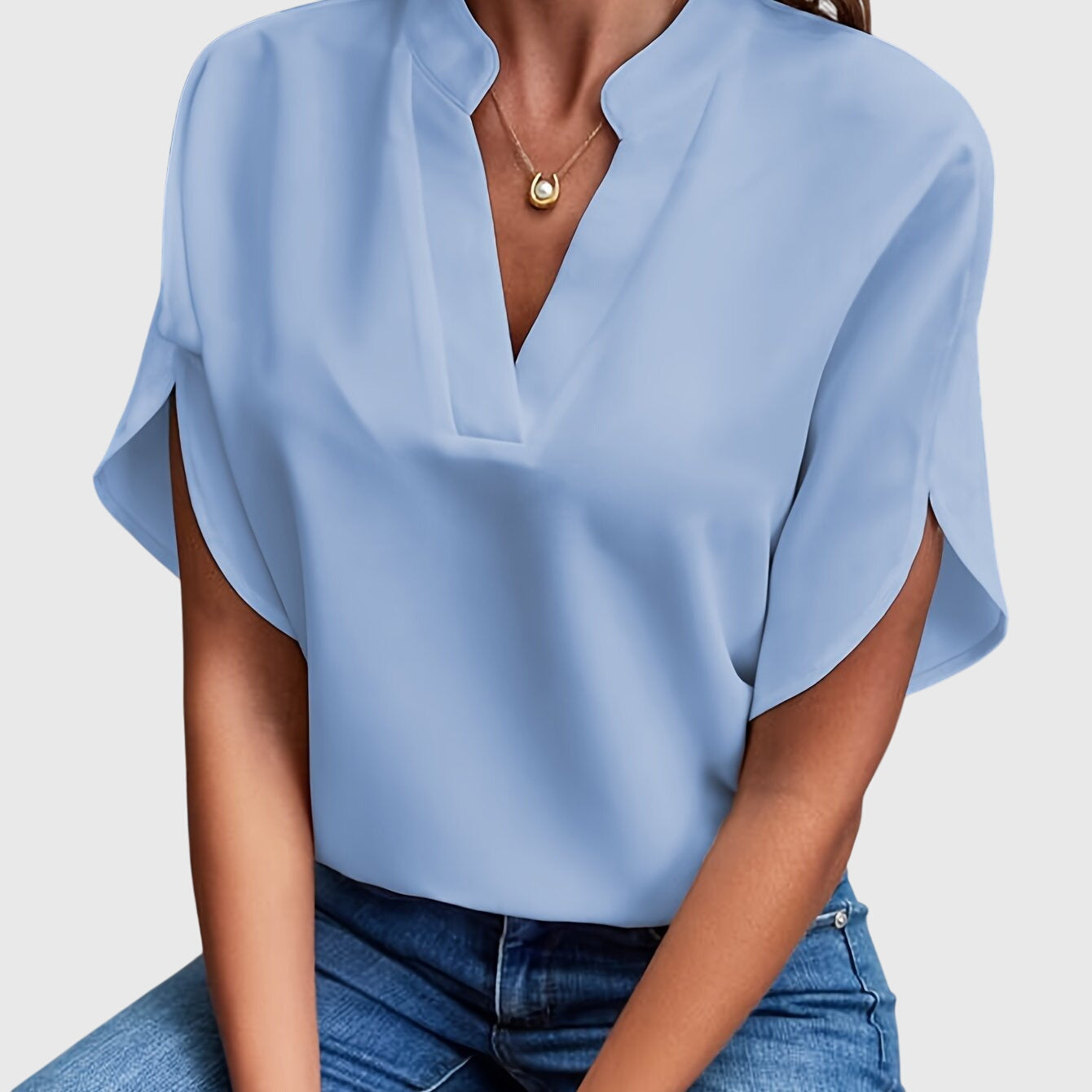 Women’s elegant blouse with tailored fit and timeless silhouette, ideal for office wear, dinners, and casual everyday styling.