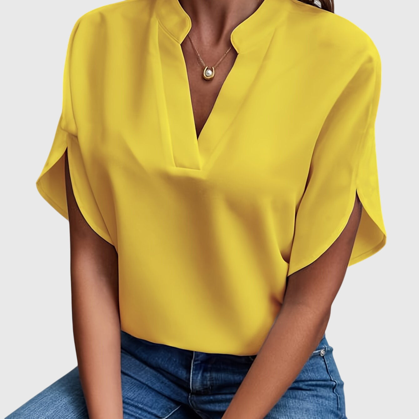Women’s elegant blouse with tailored fit and timeless silhouette, ideal for office wear, dinners, and casual everyday styling.